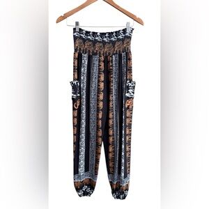 Qianxizhan: Bohemian Elephant Print Harem Pants with side Pockets